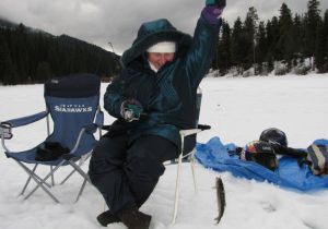 Pat from England with her first “Hard Water” caught Rainbow.