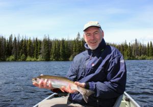 Jan From Sweden With a Nice Rainbow Trout Caught on The Fly.