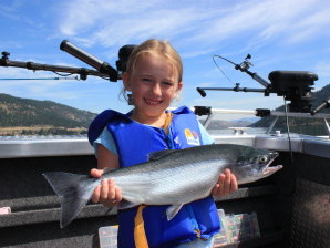 Girl with a kokanee salmon